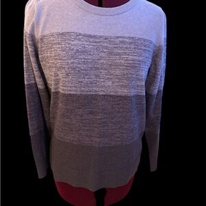 Lightweight sweater in purple.  Size Medium.
